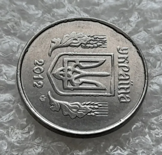 (5829) 1 копійка 2012 лишній метал на аверсі, викрошки (1 копейка 2012 брак крокодил) Де купити