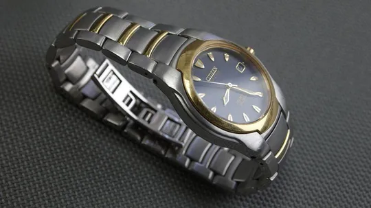 CITIZEN Eco-Drive Perpetual Calendar 100м. цельнолитая нержавейка синий циферблат model:E710-H24385T Інтернет-аукціон