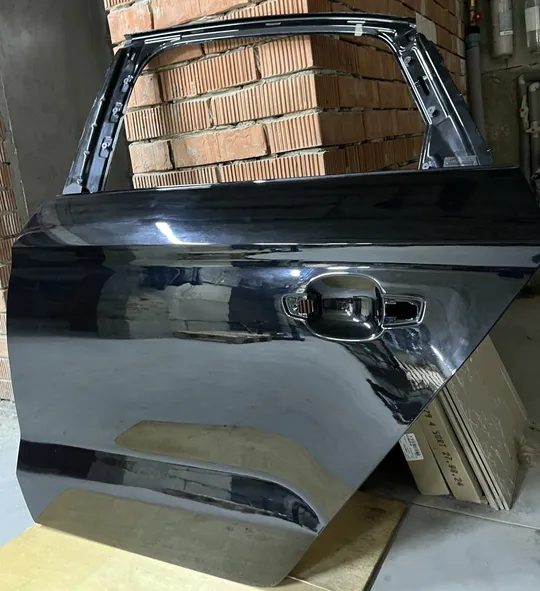 Задні ліві двері б/у Audi A3 2012-2016 sedan модель 8VS58L З аукціону