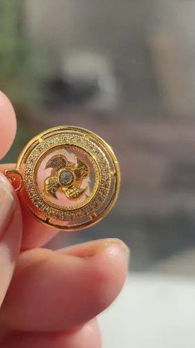 интересная красивая подвеска  підвіска с вращающейся деталью-&quot;мельницей&quot; внутри cd345 З аукціону