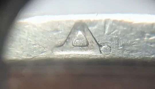 (5269) 1 гривня 2005 різновид викрошки у букві "Д" слова "ОДНА" на гурті (1 гривна 2005 брак) Продаж