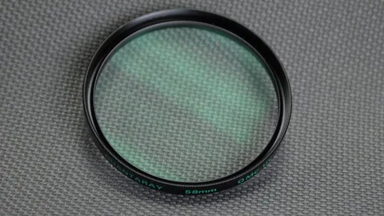 Quantaray QMC-UV 58мм. защитный ультрафиолетовый светофильтр 100% оригинал Вживане Ціна