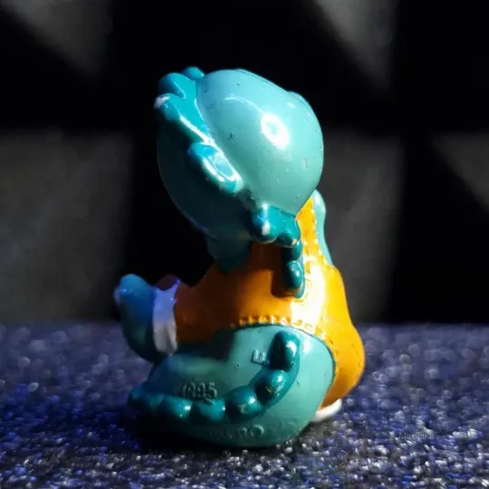 Купити Фігурка Динозавр-будівельник з Кіндер Сюрприз (Ферреро), 1995 рік.