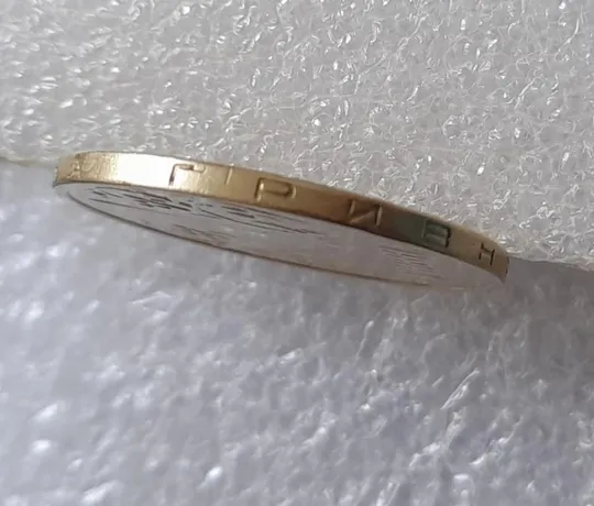 (3412) 1 гривня 2001 велика викрошка у 'Г' слова 'ГРИВНЯ' на гурті (1 гривна 2001 брак) З аукціону