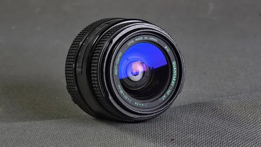 Зум объектив Quantaray-NF AF 35-80mm/4.0-5.6 Ф52mm байонет Nikon AF Multi-CoatedJapan Вживане Ціна