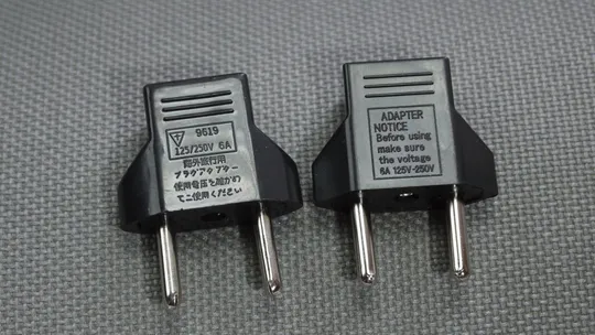 Купити 10шт. (десять) универсальные переходники сетевой адаптер US/EU америка-европа под EU розетку