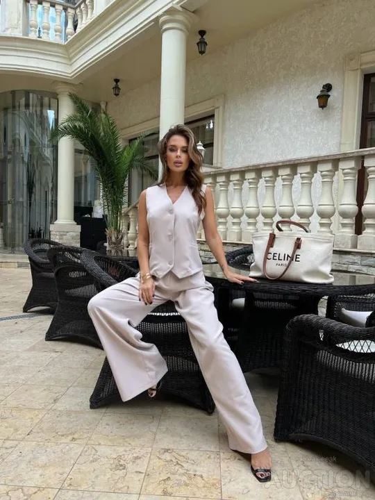 Жіночий костюм жилетка і палаццо колір бежевий Недорого