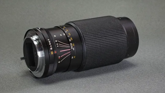 Об'єктив Konica AR телеобъектив Zoom-Hexanon 65-135mm/4.0 Ф55мм Japan Вживане Недорого