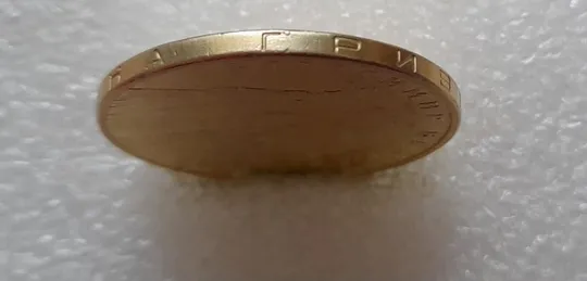 Купити (3869) 1 гривня 2006 викрошки у букві "Г" слова "ГРИВНЯ" та крапках між "2006" на гурті (брак)