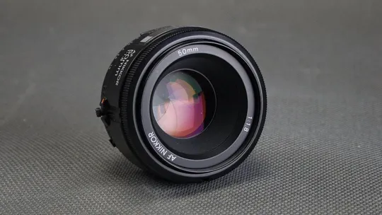 Купити штатный объектив Nikon Nikkor AF 50mm f/1.8 Ф52mm на полный кадр 24x36mm