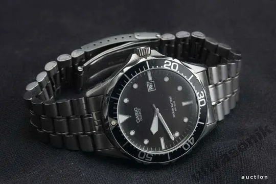 дайверские часы CASIO дата 200m WR черный циферблат литая нержавейка Ціна