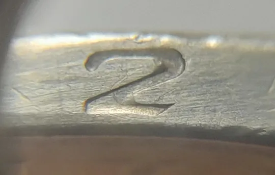 (4717) 1 гривня 2006 різновид викрошки у цифрі "2" слова "2006" на гурті (1 гривна 2006 брак) Ціна