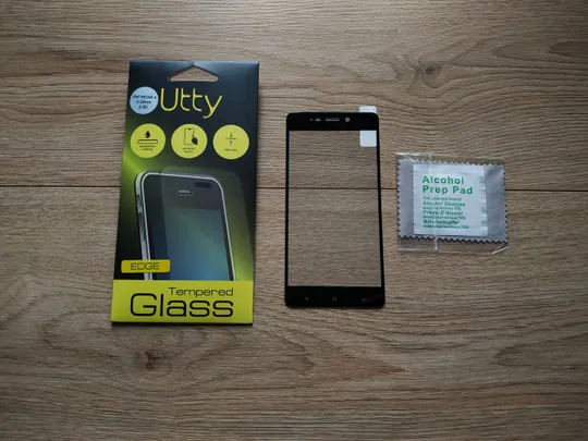 Захисне скло для Xiaomi Redmi 4  2.5 D 0.33mm Защитное стекло Utty Ціна