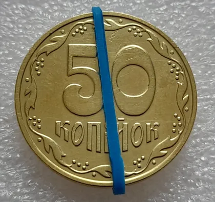 фото, (8061) 50 копійок 2023 поворот (порушення соосності) (50 копеек 2023 брак сдвиг)
