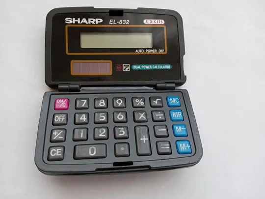 Калькулятор Sharp. Made in Japan Ціна