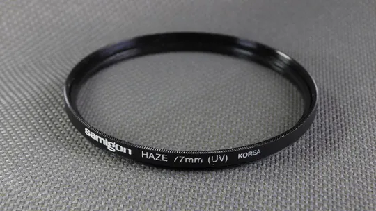 Купити Samigon Haze (UV) 77мм. защитный ультрафиолетовый светофильтр 100% оригинал Korea Вживане