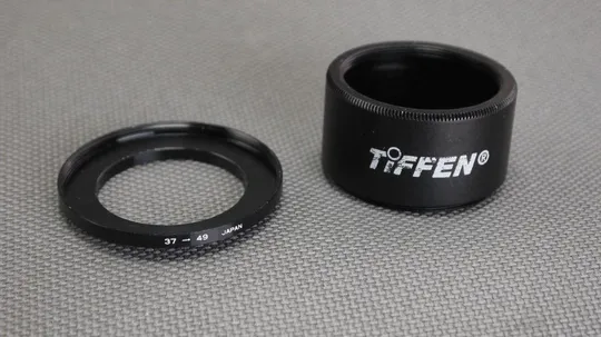 Металлический увеличивающий адаптер 37-49мм Вживане Ціна