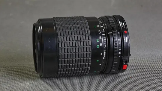 Canon FD телеобъектив Sigma Zoom-KIV 70-210mm/4-5.6 MC Ф52мм для беззеркалок Sony, Olympus и др. Де купити