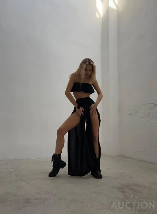 Жіночий костюм двійка спідниця-брюки та топ колір чорний Продаж