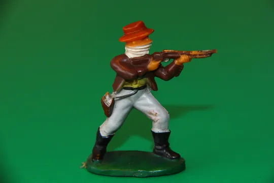 бандит ковбой ГДР №081 тип А САМУЕЛЬ БАСС Фріхольд Фішер РАННЯ ФІГУРКА  ДУЖЕ М'яка ГУМА Ціна