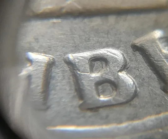 (4715) 1 гривня 2006 різновид викрошки у "2" слова "2006" на гурті + наплив металу (1 гривна 2006) Де купити