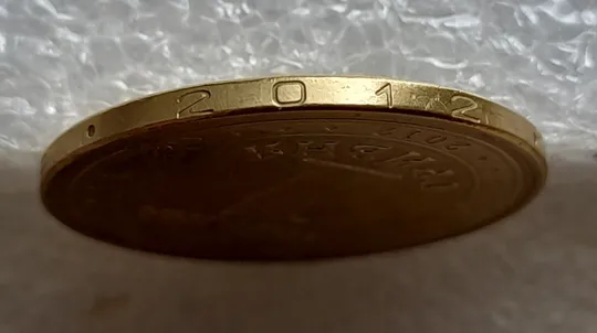 (5155) 1 гривня 2012 невелика викрошка у букві "Н" слова "ОДНА" на гурті (1 гривна 2012 брак) Інтернет-аукціон