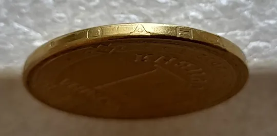 (5190) 1 гривня 2012 двійний удар вліво на буквах "ВОЛОДИМИР" на реверсі (1 гривна 2012 брак) Торговий майданчик