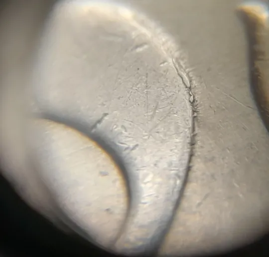 (7953) 50 копійок 2009 викрошки на нулі номіналу (50 копеек 2009 брак) Де купити