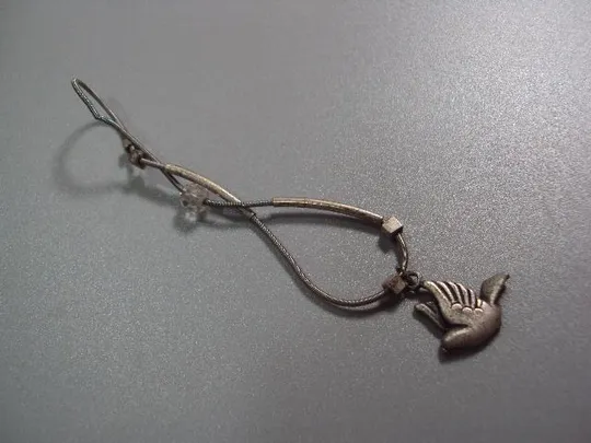 Бижутерия браслет посеребрение с подвеской голубь тянется на пружине №10841 Ціна