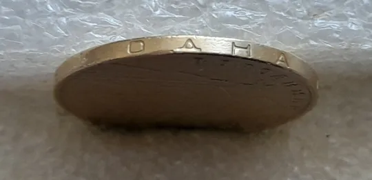 (6931) 1 гривня 2006 різновид викрошки у букві "Р" слова "ГРИВНЯ" на гурті + двійний удар на реверсі (1 гривна 2006 брак) в Україні