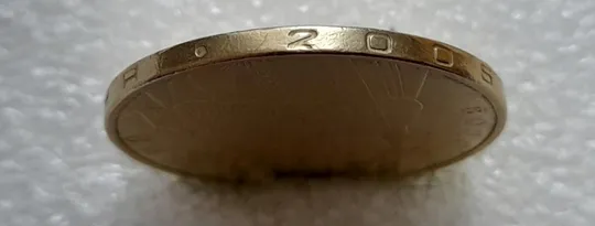 Купити (4715) 1 гривня 2006 різновид викрошки у "2" слова "2006" на гурті + наплив металу (1 гривна 2006)