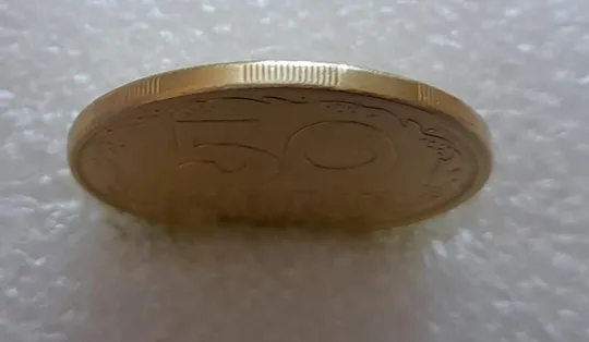 (4061) 50 копійок 1994 1.1АЕм викрошки на вінку між 5-6 та 6-7 гронами (50 копеек 1994 брак) Інтернет-аукціон