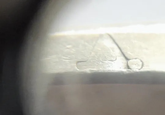 Купити (6611) 1 гривня 2014 викрошки у букві "Д" слова "ОДНА" та у 'Г' слова 'ГРИВНЯ' на гурті (1 гривна 2014 брак)