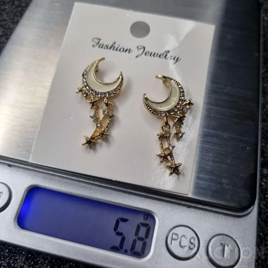 Сережки у формі місяця та зірки З аукціону