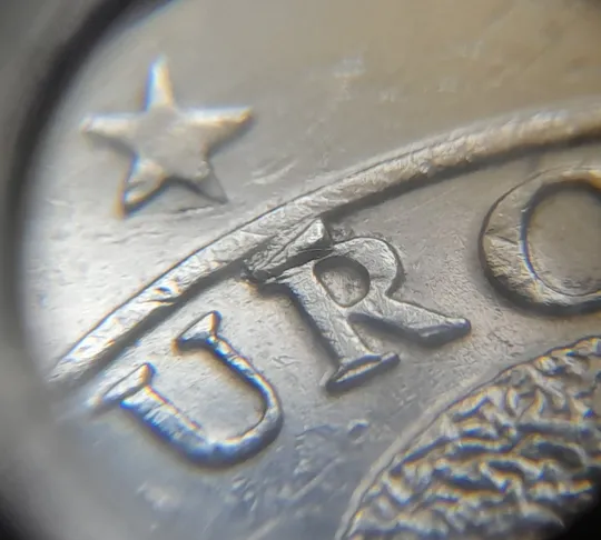 Купити (2250) 50 євроцентів 2002 Австрія викрошки на аверсі (50 евроцентов 2002 Австрия брак)