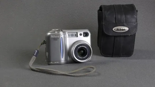 цифровой фотоаппарат Nikon Coolpix 4300 + Zoom Nikkor 8-24mm/2.8-4.9 + чехол Ціна