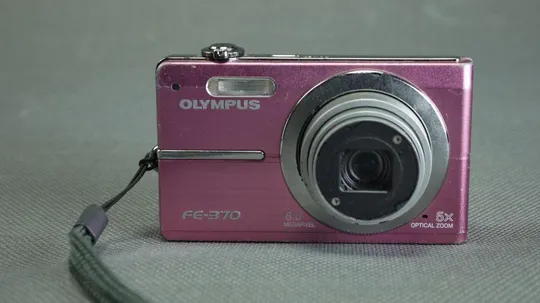 Цифровой фотоаппарат 8.0Mpix Olympus FE-370 + 4.55-18.2 мм EQ 28-112 мм Zoom lens x4 рожевий Вживане Ціна