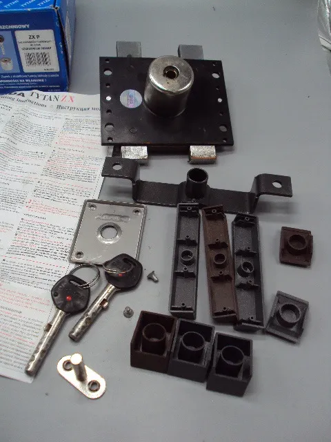 Замок дверной накладной с поворотной ручкой GERDA TYTAN ZX титан б/у №16022 На торгах