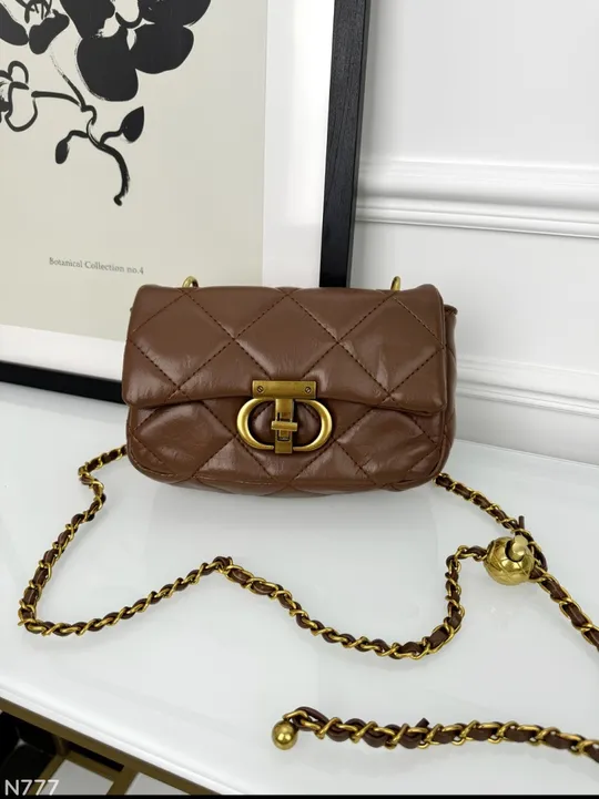 Сумочка через плече на довгому декоративному ланцюжку Ціна