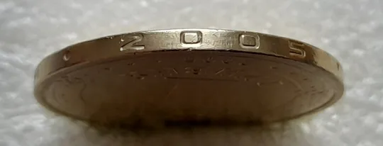 Купити (5577) 1 гривня 2005 викришки у першій цифрі "0" слова "2005" та в букві "Р" слова "ГРИВНЯ" на гурті (1 гривна 2005 брак)