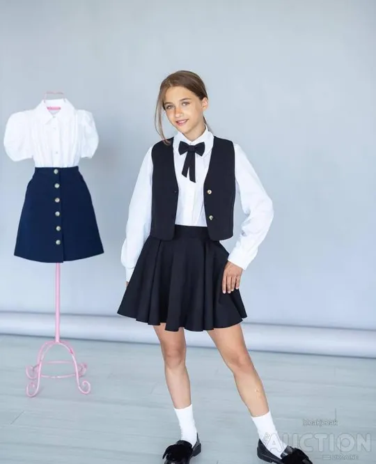 Комплект жилет та спідниця для дівчинки колір чорний Продаж