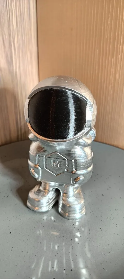Фігурка астронавту хром Ціна