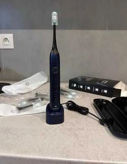 Зубна щітка Sarmocare в ідеальному стані, трошки заклинює стартова кнопка, зарядна док-станція в наявності! Ціна