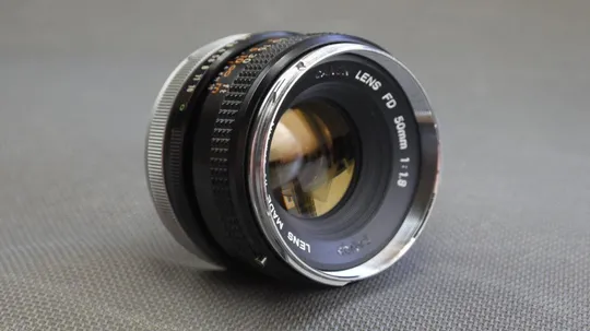 объектив Canon FD 50mm/1.8 металлический Ф52мм на полный кадр (24x36mm) Де купити