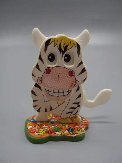 фото, Фигурка киндер сюрприз корова с цветами серия Bewegliche Kuh Веселые животные K96 n.38 №18591м