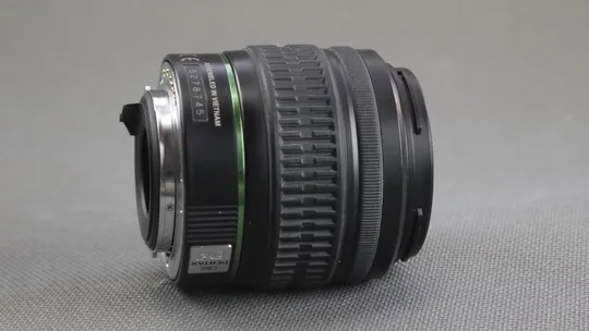 Об&#039;єктив SMC Pentax-DA AF 18-55mm 1:3.5-5.6 AL Ф52мм штатный зум для цифровыx камер Pentax Вживане Де купити
