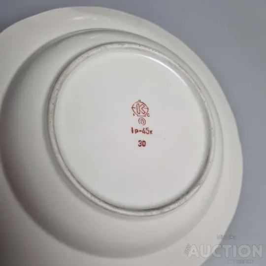 Порцелянові тарілки 9 шт. Інтернет-аукціон