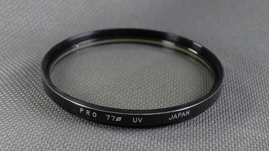 Купити PRO (UV) 77мм. защитный ультрафиолетовый светофильтр 100% original Japan Вживане