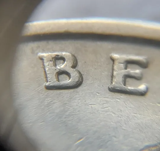 (7328) 1 гривня 2006 різновид викрошки у букві "Р" слова "ГРИВНЯ" на гурті + зминання на реверсі (1 гривна 2006 брак) Де купити