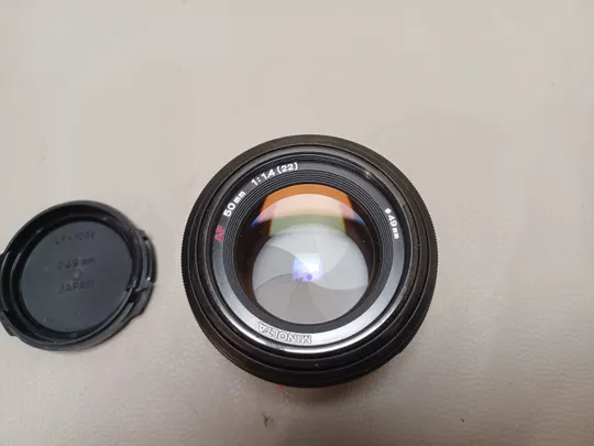 0412 світлосильний стандартний об'єктив із автофокусом  Minolta AF 50mm f/1.4 НІМЕЧЧИНА З аукціону